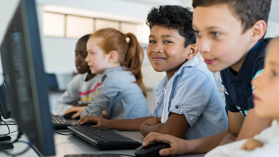 Group of kids in a computer lab